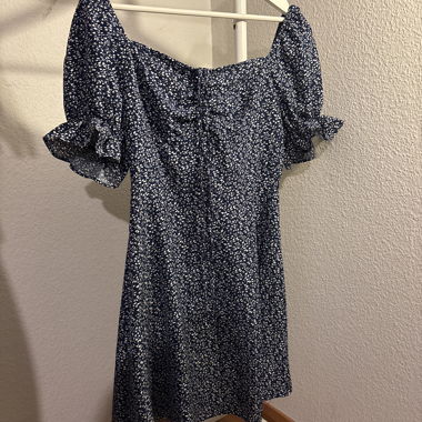 Blue floral dress with ruffle sleeves