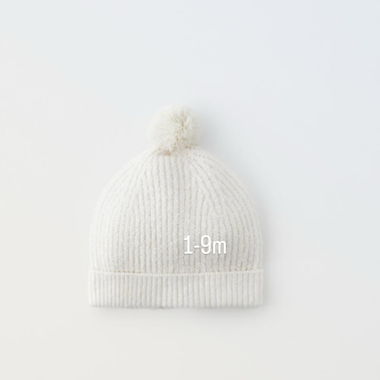White newborn hat with pom pom