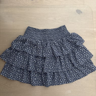 Gonna mini con balze floreali