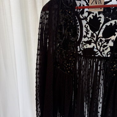 Blouse en dentelle noire transparente avec dentelle à motifs