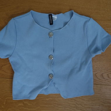 Top con bottoni azzurro H&M