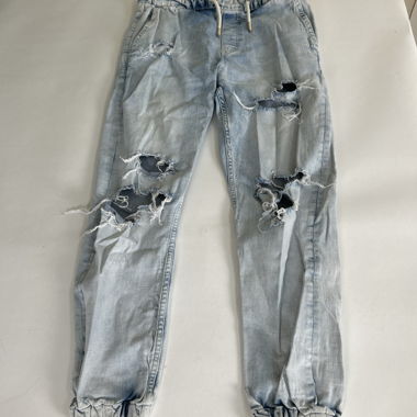 Distressed light wash jeans