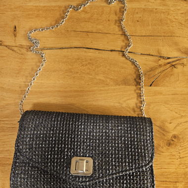 Blue clutch with chain strap