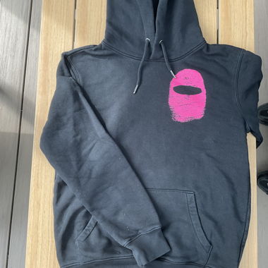 Black hoodie with pink hood motif