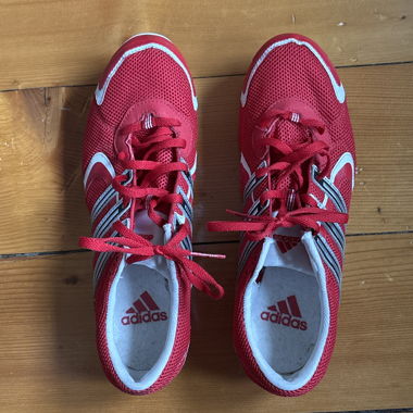 Red adidas Athletics Spikes
