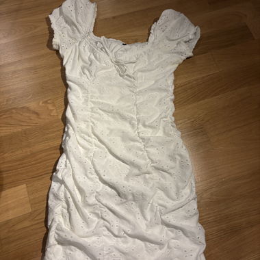 White mini dress with eyelet embroidery