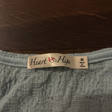 Blaues tailliertes Top