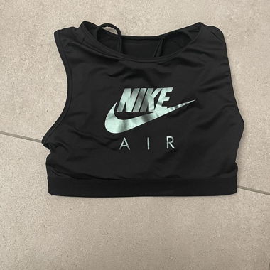 black shiny nike sports top with built in bra