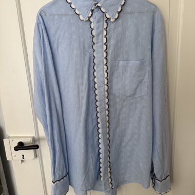 blue button down with embroidery 