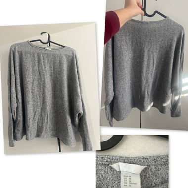 Grauer Pullover
