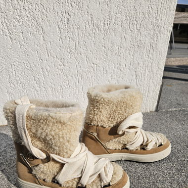 Schneeschuhe Bogner. Aufklappbare Eiskufen an Sole