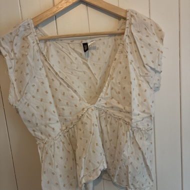 Light Blouse with Floral Pattern