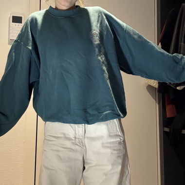 Pull bleu pétrole