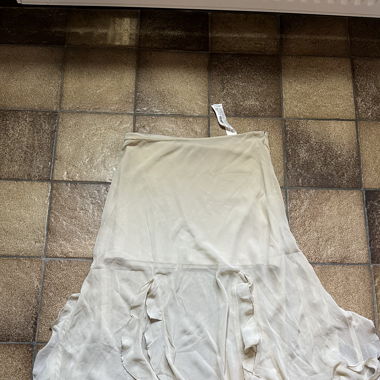 Jupe beige à frange 