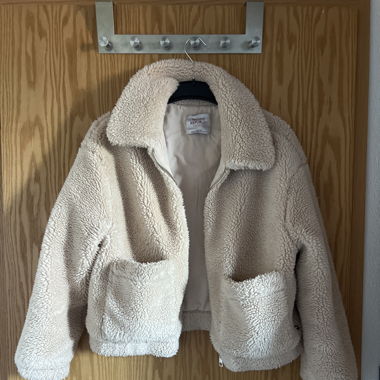 Veste fausse fourrure beige 