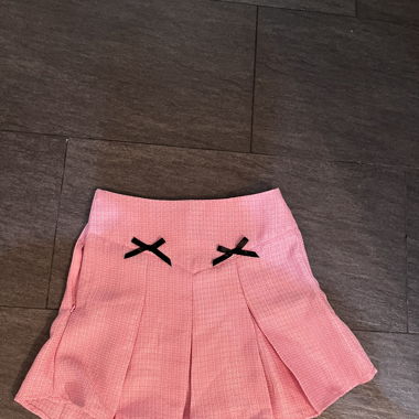 Pink Pleated Mini Skirt with Black Bows