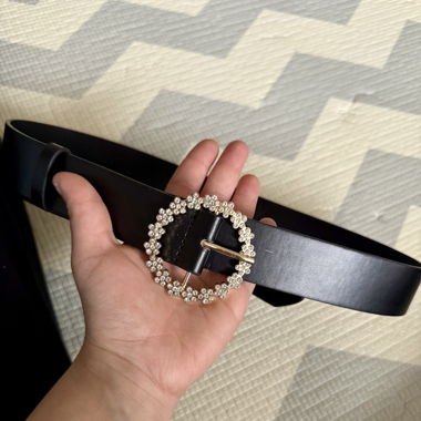 Black belt with round jewel buckle