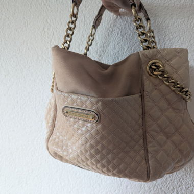 Beige quilted shoulder bag with chain straps