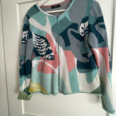 Cardigan con zip e motivo