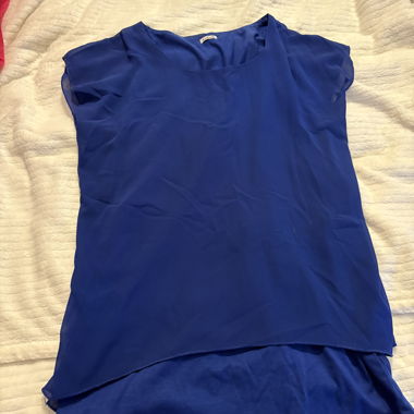 Top Azzurro Senza Maniche