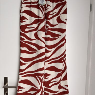 Pantaloni con motivo rosso/crema S