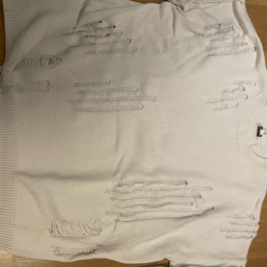 White ripped-look sweater