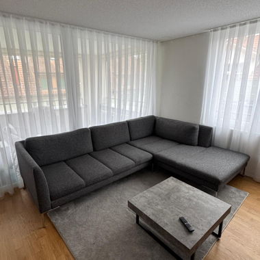 Dark gray corner sofa