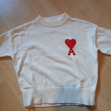 White Sweater with Heart Logo