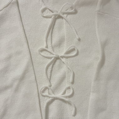 White cardigan with decorative ties
