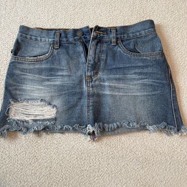 Rusty blue distressed denim mini skirt
