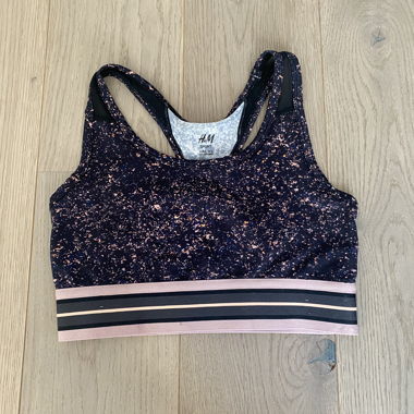 Sport-BH H&M schwarz mit geflecktem Muster