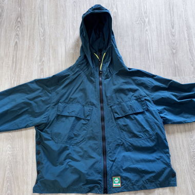 Blue hooded windbreaker jacket from Braindead