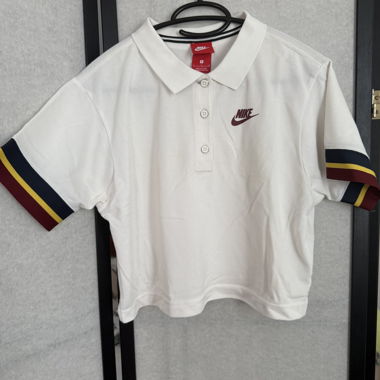 Polo Nike blanc à bandes