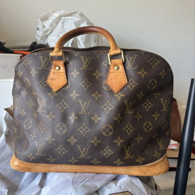Louis Vuitton Alma Handbag