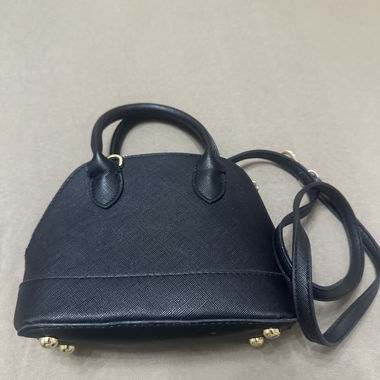 Black bag with gold detail.