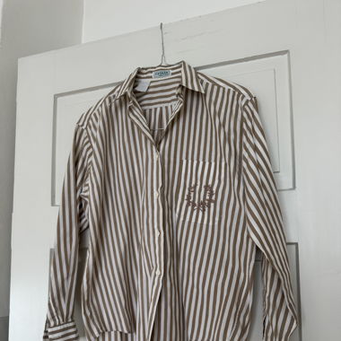 Minimalistic striped blouse with an embroidery 