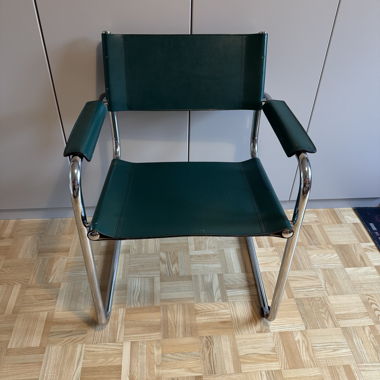 Green cantilever chair