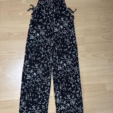 Tuta pantalone nera a fiori bianchi 13 anni
