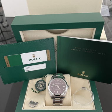 Rolex Oyster Perpetual 39 Rot Komplettset
