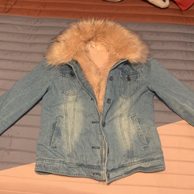 Denim jacket with pink faux fur collar