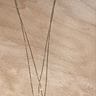 Chaîne en or avec deux pendentifs ronds