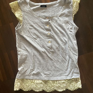 Top with buttons and yellow lace