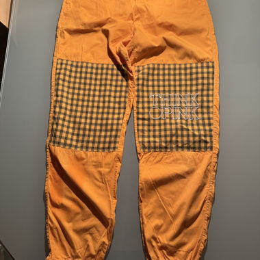 Pantaloni Think Pink arancione-giallo