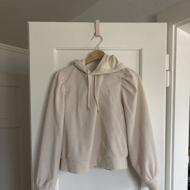 Creme-farbener Hoodie in Manchester Optik