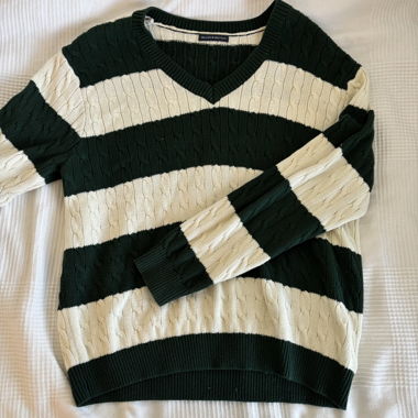 green and white knitted sweater