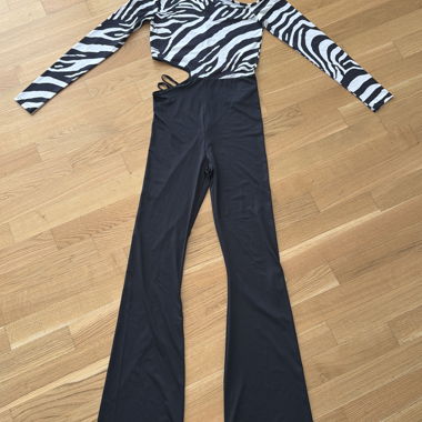 Jumpsuit mit Zebra-Print und Schwarz