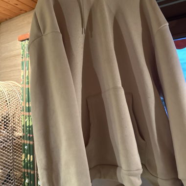 Sweater with lettering on the back