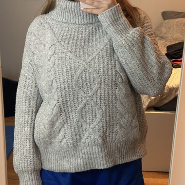 Grey cable-knit sweater