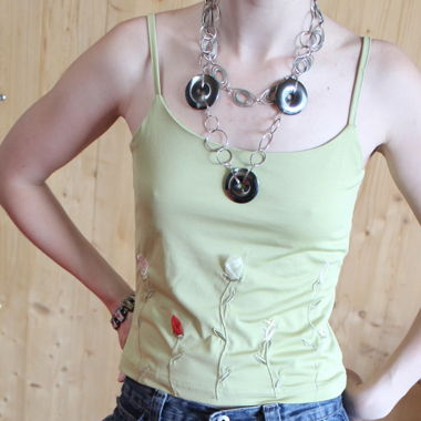 Green top with flowers