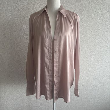 Blusa rosa a maniche lunghe